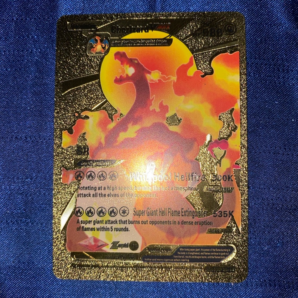 Pokemon VMAX Charizard Card with Gold and Black Design